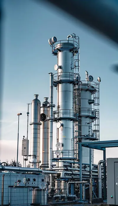 Industrial processing plant with towers and pipelines